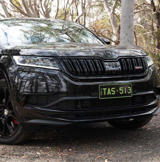 Colour on Black Green on Black plate on a Black Skoda