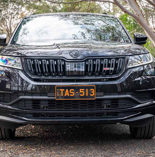 Colour on Black Orange on Black plate on a Black Skoda