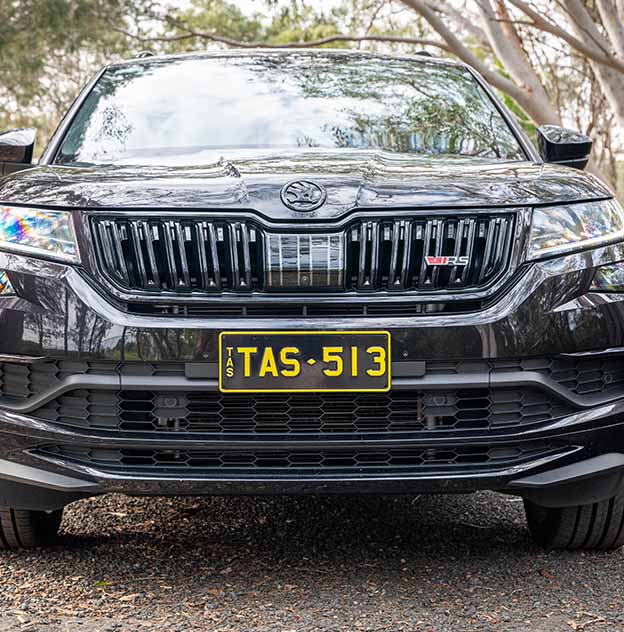 Colour on Black Yellow on black plate on a Black Skoda