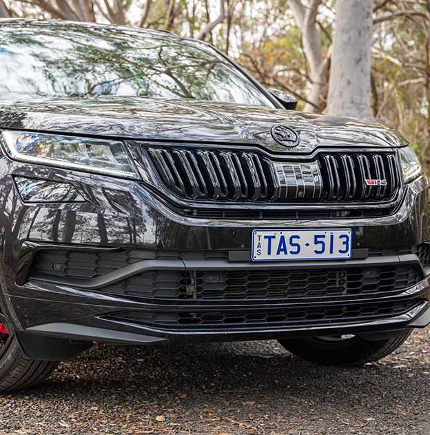 Black Skoda with TAS 513 plate content on a MyColour Blue on White plate