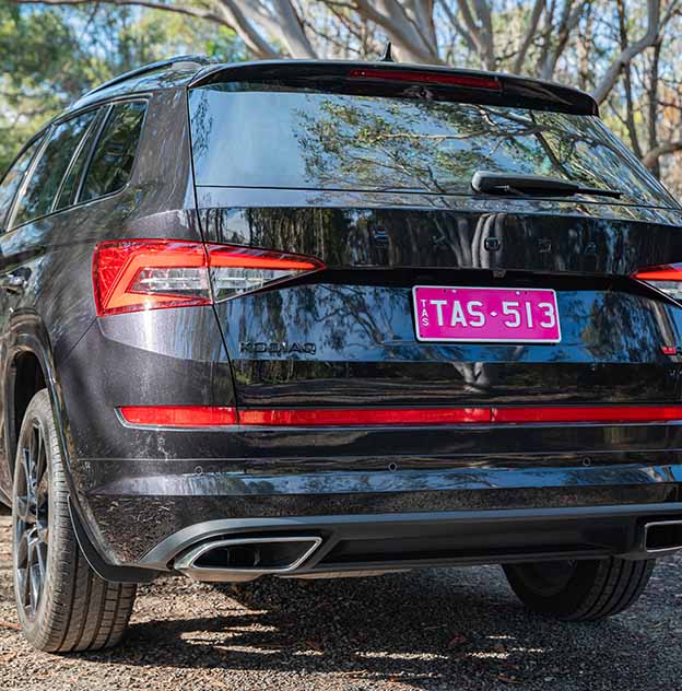 Black Skoda with TAS 513 plate content on a MyColour White on Pink plate