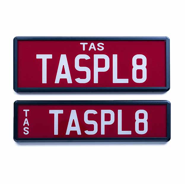 Car Individual Plates Prestige white on maroon plate with TASPL8 content
