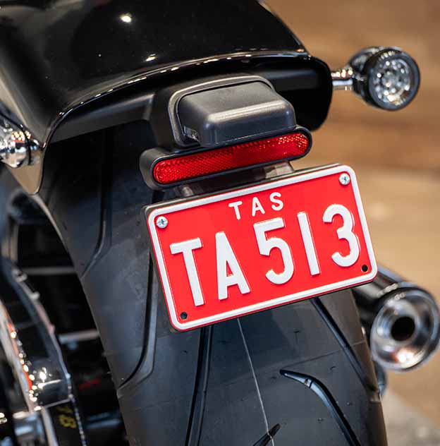 Motorcycle 2 white on red plate