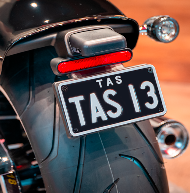 MyColour Silver on Black motorcycle plate on a Harley Davidson